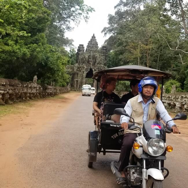 Cambodian taxi leaving the temple